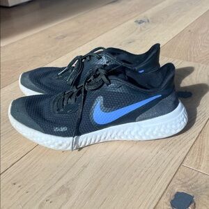 Nike Black Running Sneakers with Blue Swoosh